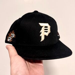 Primitive Black Snapback Cap with White Script Logo